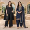 Black festive co-ord set beside a navy traditional Punjabi suit