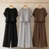 Black, silver grey and cocoa brown linen co-ord sets in a boutique