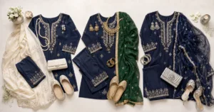 Navy blue suit styled with ivory, green and silver accessories