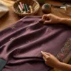 Suit fabric preparation with measuring tape, lining and tailoring tools