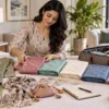 Woman preparing fabric, shoes and a garment for a boutique visit
